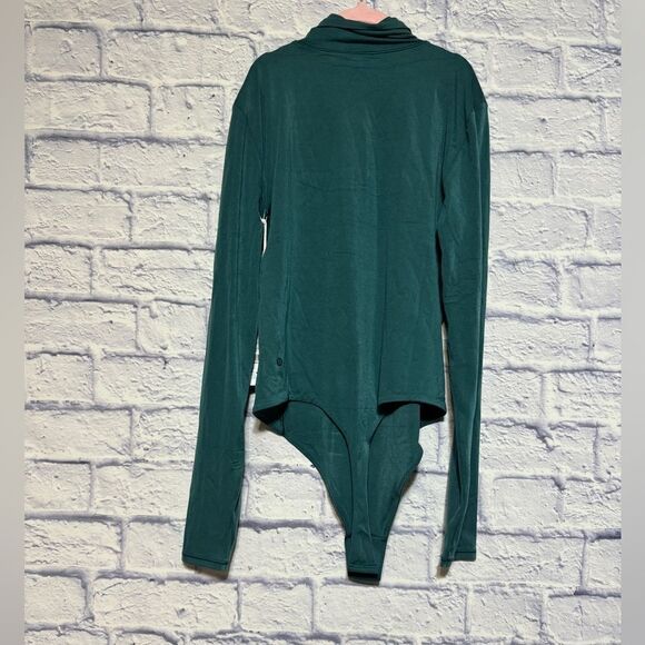 Lululemon Wundermost Ultra-Soft Nulu Turtleneck Bodysuit
Storm Teal - Picture 10 of 15